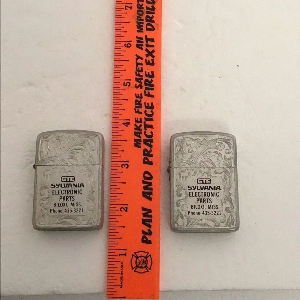 Pair of vintage PARK Venetian embossed advertising lighters